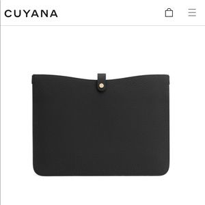 Cuyana laptop sleeve in black pebbled leather. Designed for 13” laptop.